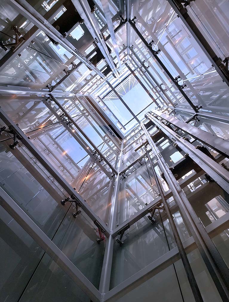 Glass Elevator shaft with 360 transparent view up